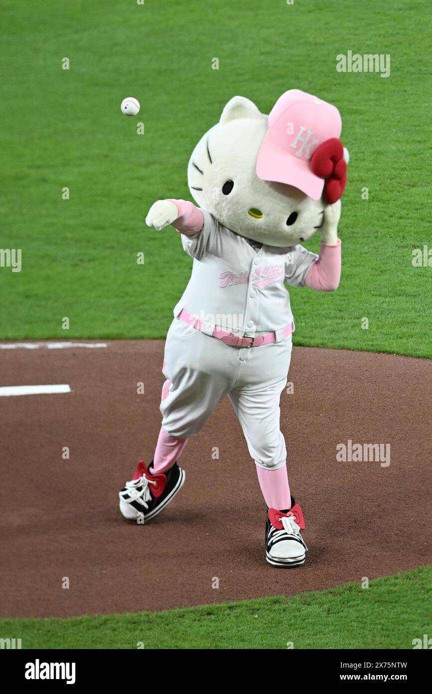 Mascot Hello Kitty throws at the ceremonial first pitch on Hello Kitty