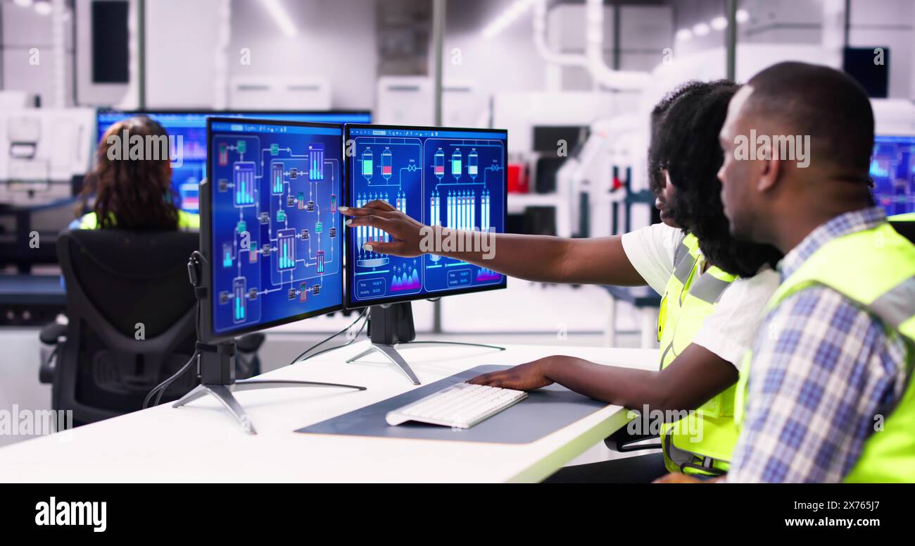 Engineer Operators Using Scada System At Industrial Plant Stock Photo ...