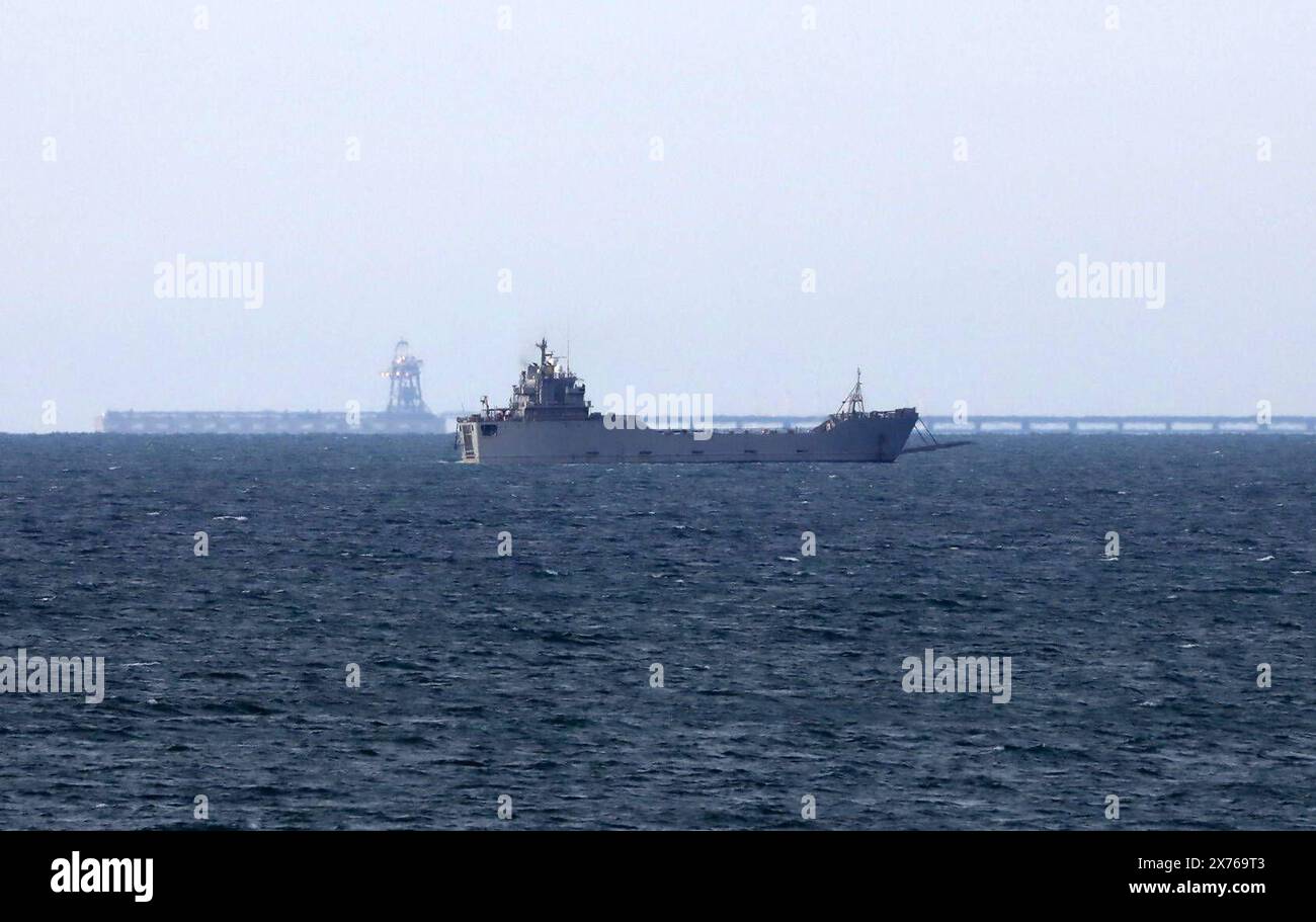 Ships sail off the coast of the Gaza Strip, 17 May 2024. The US Central Command CENTCOM said that trucks carrying humanitarian assistance Ships sail off the coast of the Gaza Strip, 17 May 2024. The US Central Command CENTCOM said that trucks carrying humanitarian assistance began moving ashore via a temporary pier in Gaza at about 9 am local time 6 am UTC on 17 May, adding that no US troops went ashore . The move is part of international community efforts to increase humanitarian assistance to the residents of Gaza affected by the ongoing conflict. Since 07 October 2023, up to 1.7 million peo Stock Photo