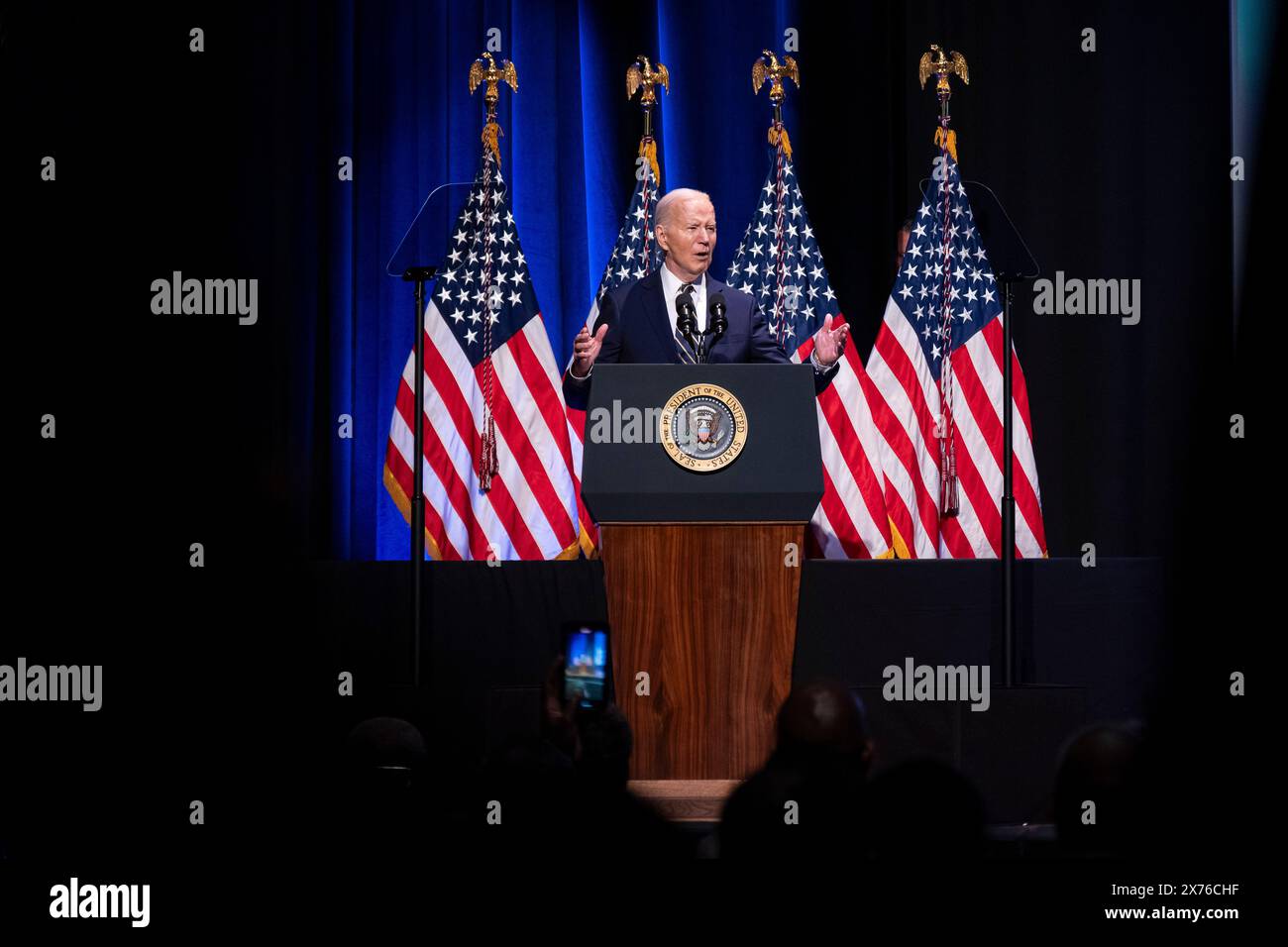 Washington, USA. 17th May, 2024. US President Joe Biden speaks at the National Museum of African American History and Culture in Washington, DC, US, on Friday, May 17, 2024. Black voters have long been a reliable mainstay of the Democratic Party, but Donald Trump, the former president and current Republican nominee, is garnering 22% support from Black voters in battleground states including Georgia. Photographer: Al Drago/Pool/Sipa USA Credit: Sipa USA/Alamy Live News Stock Photo