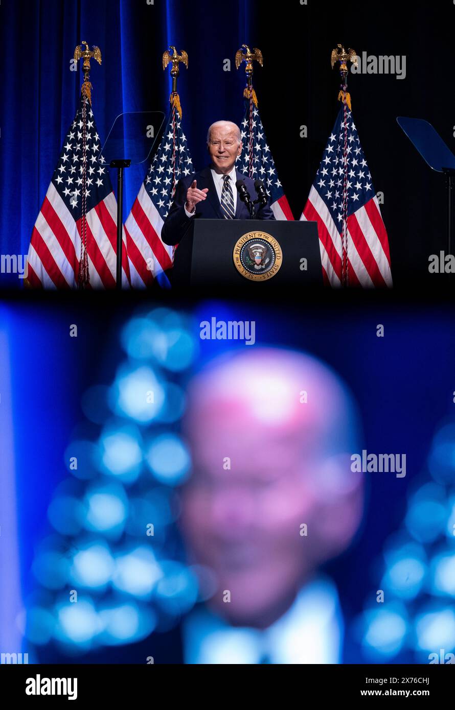 Washington, USA. 17th May, 2024. US President Joe Biden speaks at the National Museum of African American History and Culture in Washington, DC, US, on Friday, May 17, 2024. Black voters have long been a reliable mainstay of the Democratic Party, but Donald Trump, the former president and current Republican nominee, is garnering 22% support from Black voters in battleground states including Georgia. Photographer: Al Drago/Pool/Sipa USA Credit: Sipa USA/Alamy Live News Stock Photo