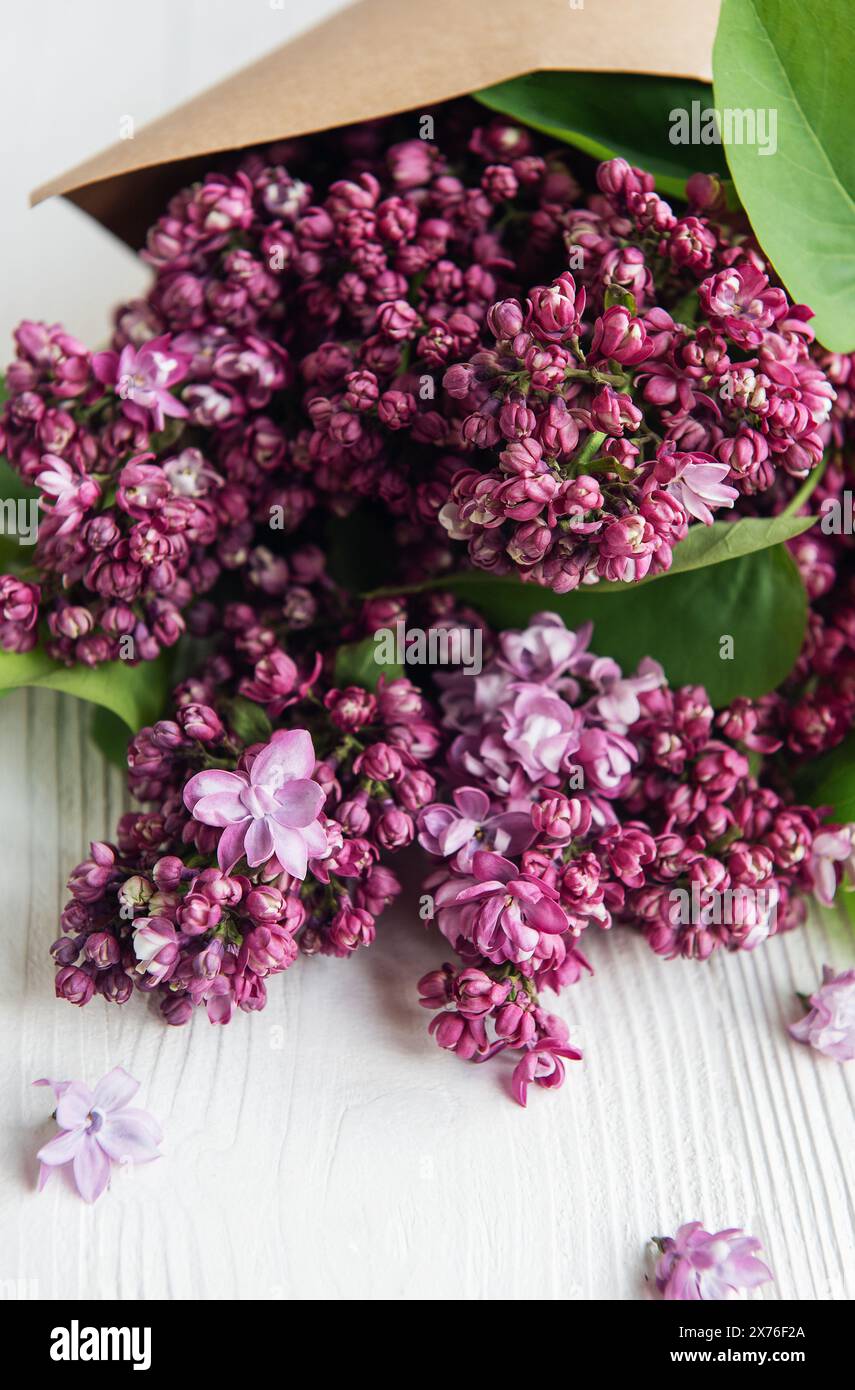 Purple lilac flower bouquet. Spring concept Stock Photo - Alamy