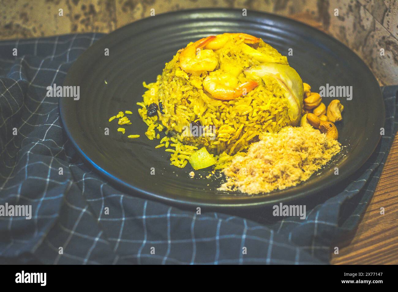 pineapple fried rice with shrimp, raisins, cashews and pork floss on