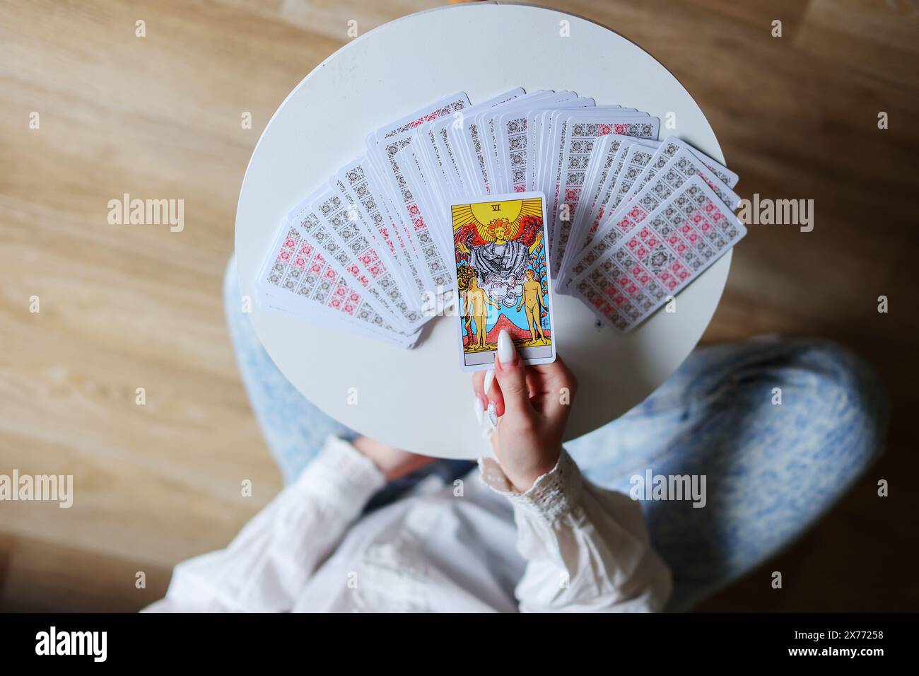 Tarot prediction esoteric fortune telling cards on table  Stock Photo