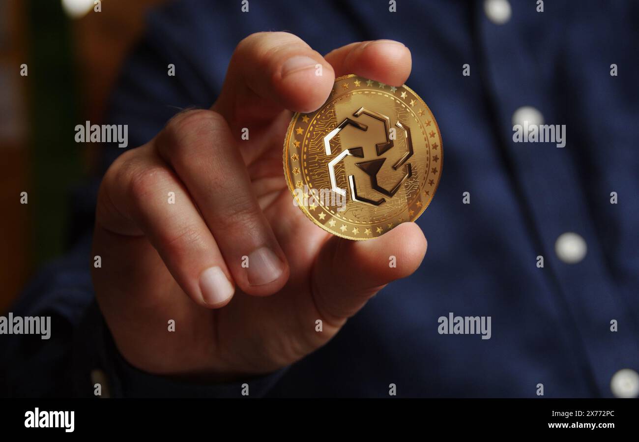 UNUS SED LEO cryptocurrency golden coin in hand abstract concept Stock  Photo - Alamy