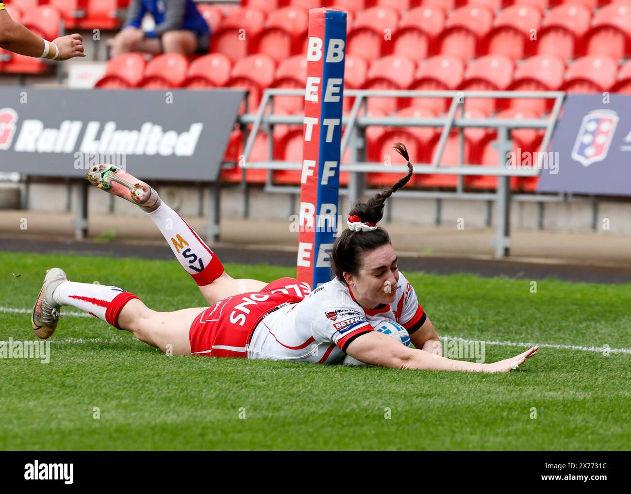 Saint Helens' Leah Burke scores the opening try during the Betfred