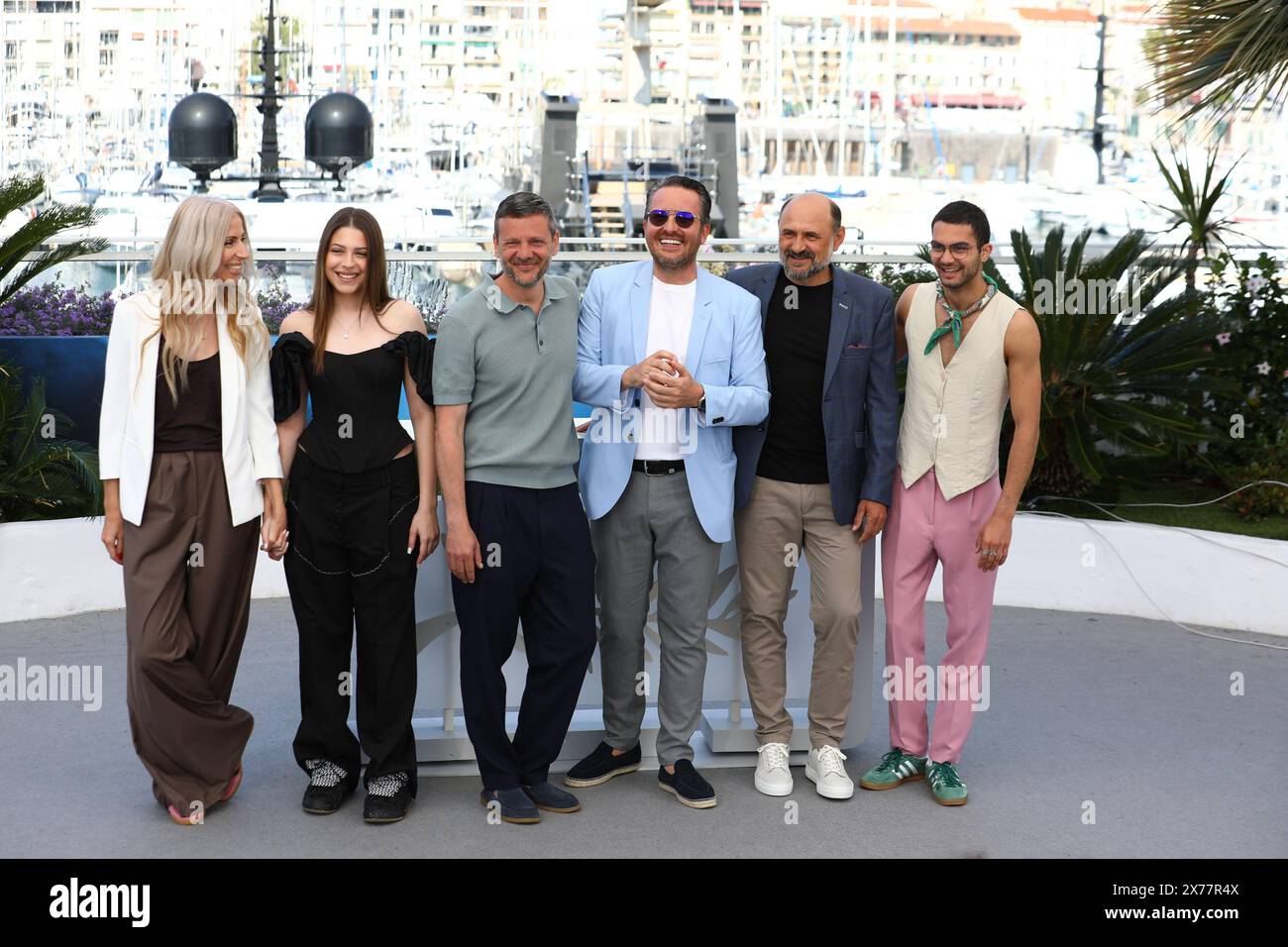 May 18, 2024, Cannes, Cote D'azur, France: Producer MIRUNA BERESCU, INGRID MICU-BERESCU,CIPRIAN CHIUJDEA, director EMANUEL PARVU, VALERIU ANDRIUTA and BOGDAN DUMITRACHE attend the 'Three Kilometers to the End of the World' photocall at the 77th Annual Cannes Film Festival at Palais des Festivals in Cannes, France (Credit Image: © Mickael Chavet/ZUMA Press Wire) EDITORIAL USAGE ONLY! Not for Commercial USAGE! Stock Photo