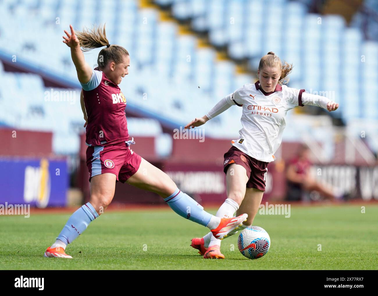 Birmingham, UK. 18th May, 2024. Kirsty Hanson of Aston Villa challenges Jess Park of Manchester City during The FA Women's Super League match at Villa Park, Birmingham. Picture credit should read: Andrew Yates/Sportimage Credit: Sportimage Ltd/Alamy Live News Stock Photo