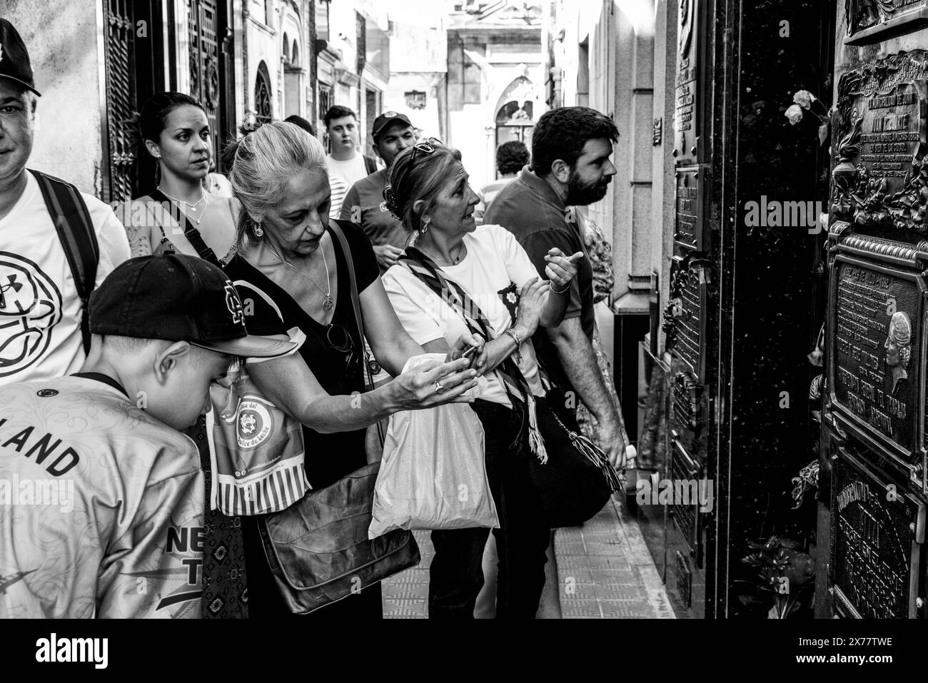 Visitors Gather At The Tomb of Eva Peron (also known as Evita), The Recoleta Cemetery, Buenos Aires, Argentina. Stock Photo