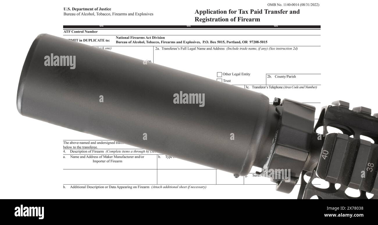 Assault rifle with a silencer above the public domain ATF form to own a ...