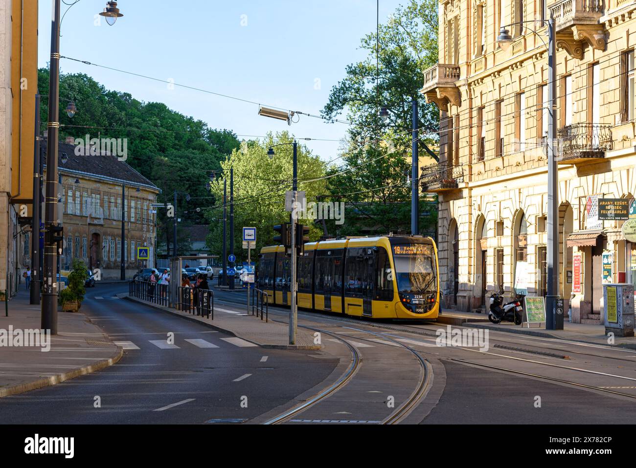A CAF Urbos 3 tram on the street in Budapest Stock Photo