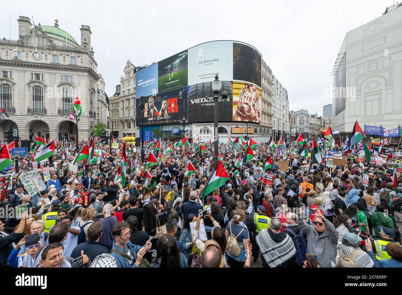 London, UK, 18 May, 2024. Pro Palestinian protesters walk past a Pro-Israel demonstration organised by group Enough Is Enough in Central London as the conflict between Palestinians and Israelis continues. Stock Photo
