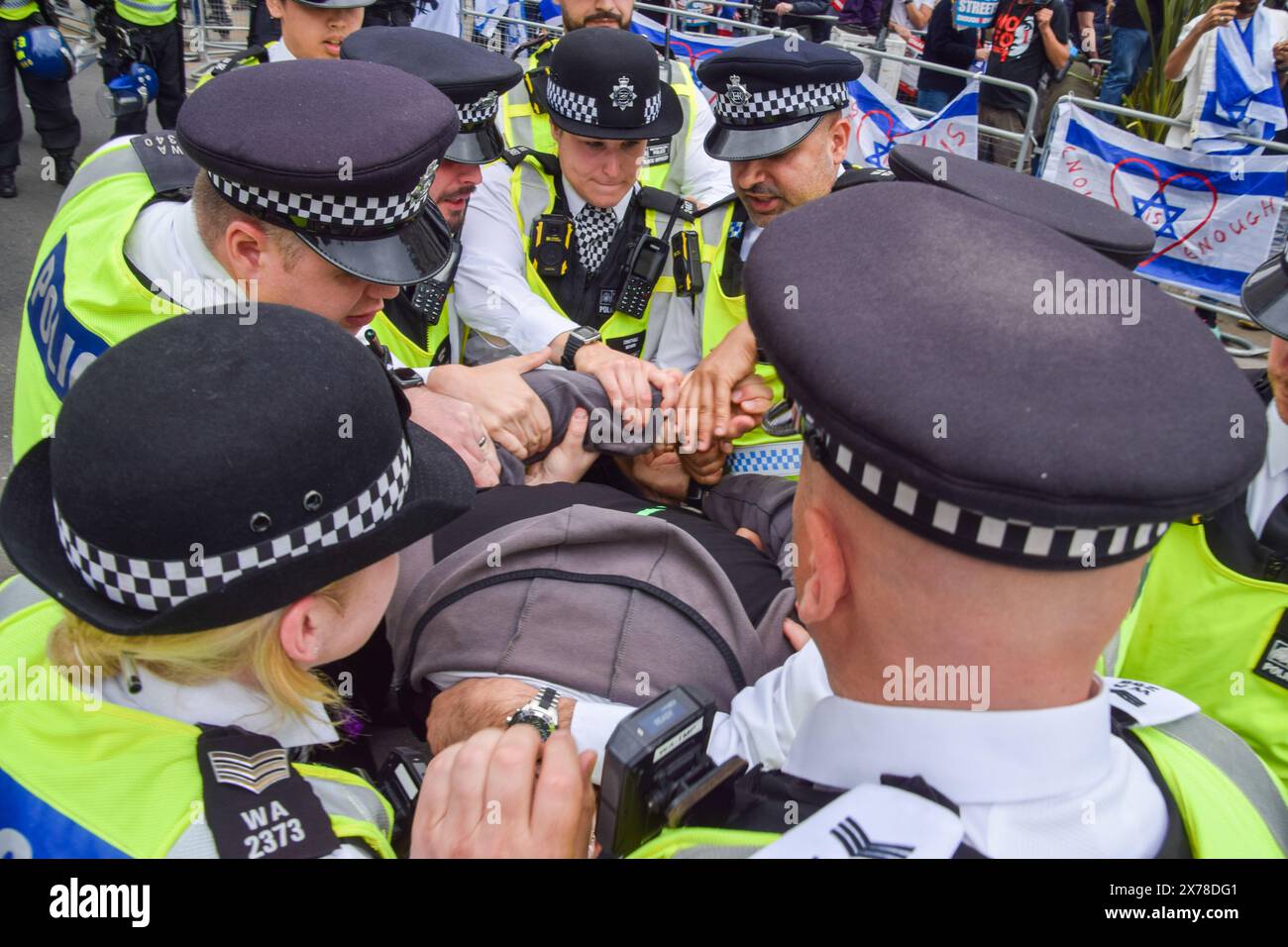 London, UK. 18th May 2024. Police officers arrest a protester in Piccadilly Circus. Thousands of people marched in solidarity with Palestine on the 76th anniversary of the Nakba, as Israel continues its attacks on Gaza. Credit: Vuk Valcic/Alamy Live News Stock Photo