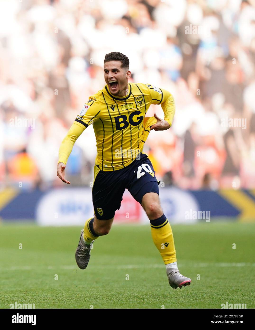 Oxford United's Ruben Rodrigues celebrates their side’s promotion to