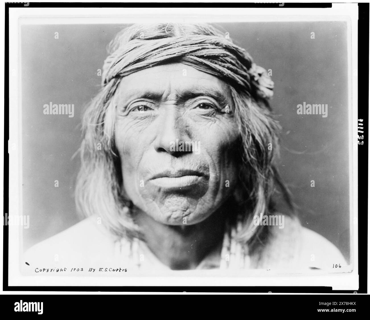 Headandshoulders portrait of Shiwawatiwa, a Zuni Indian, facing front