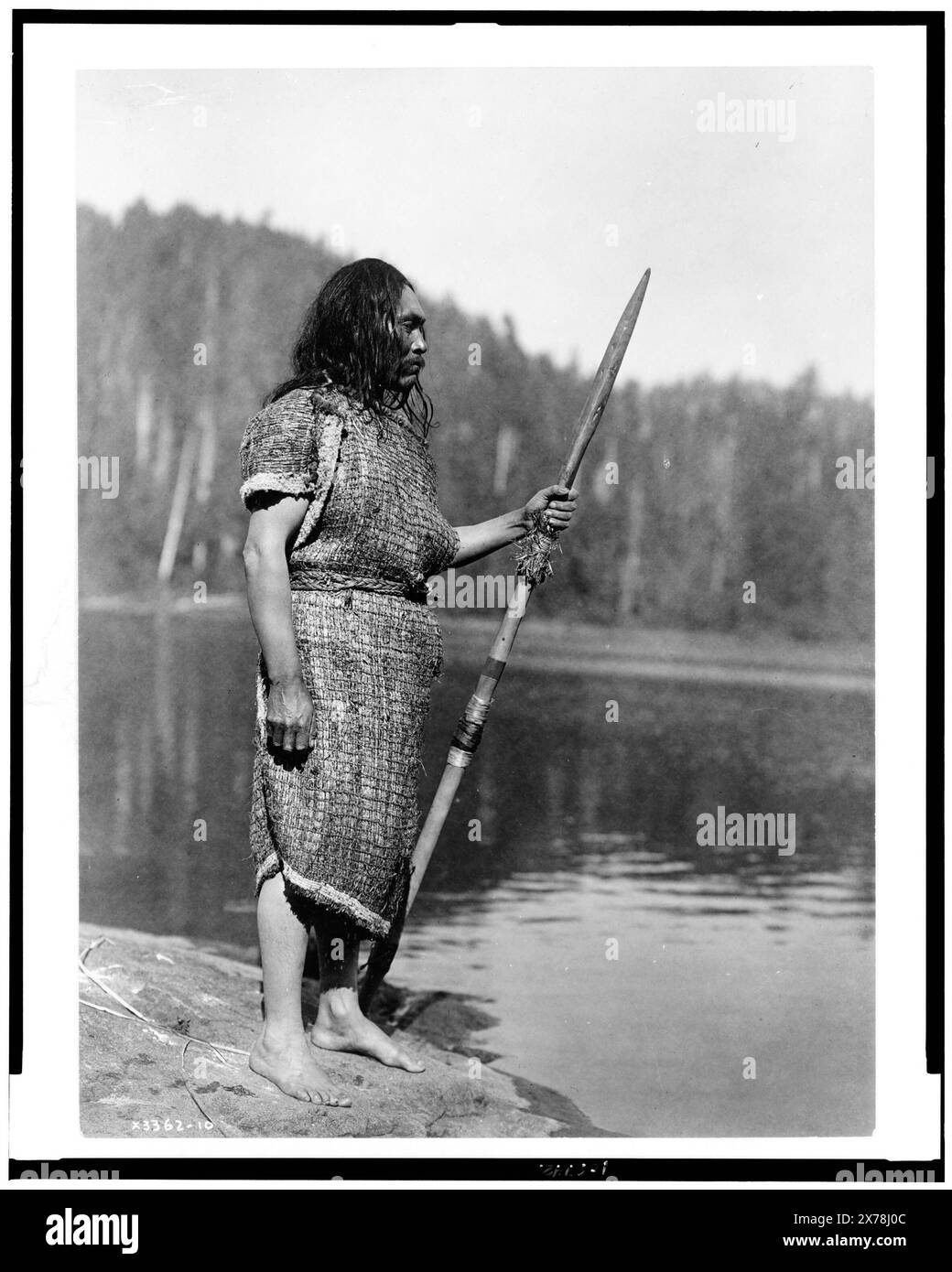 The whaler Clayoquot, Edward S. Curtis Collection ., Curtis no. 3362-10., Published in: The North American Indian / Edward S. Curtis. [Seattle, Wash.] : Edward S. Curtis, 1907-30 suppl., v. 11, pl. 394.. Indians of North America, Washington (State), Clothing & dress, 1910. , Nootka Indians, Clothing & dress, 1910. Stock Photo