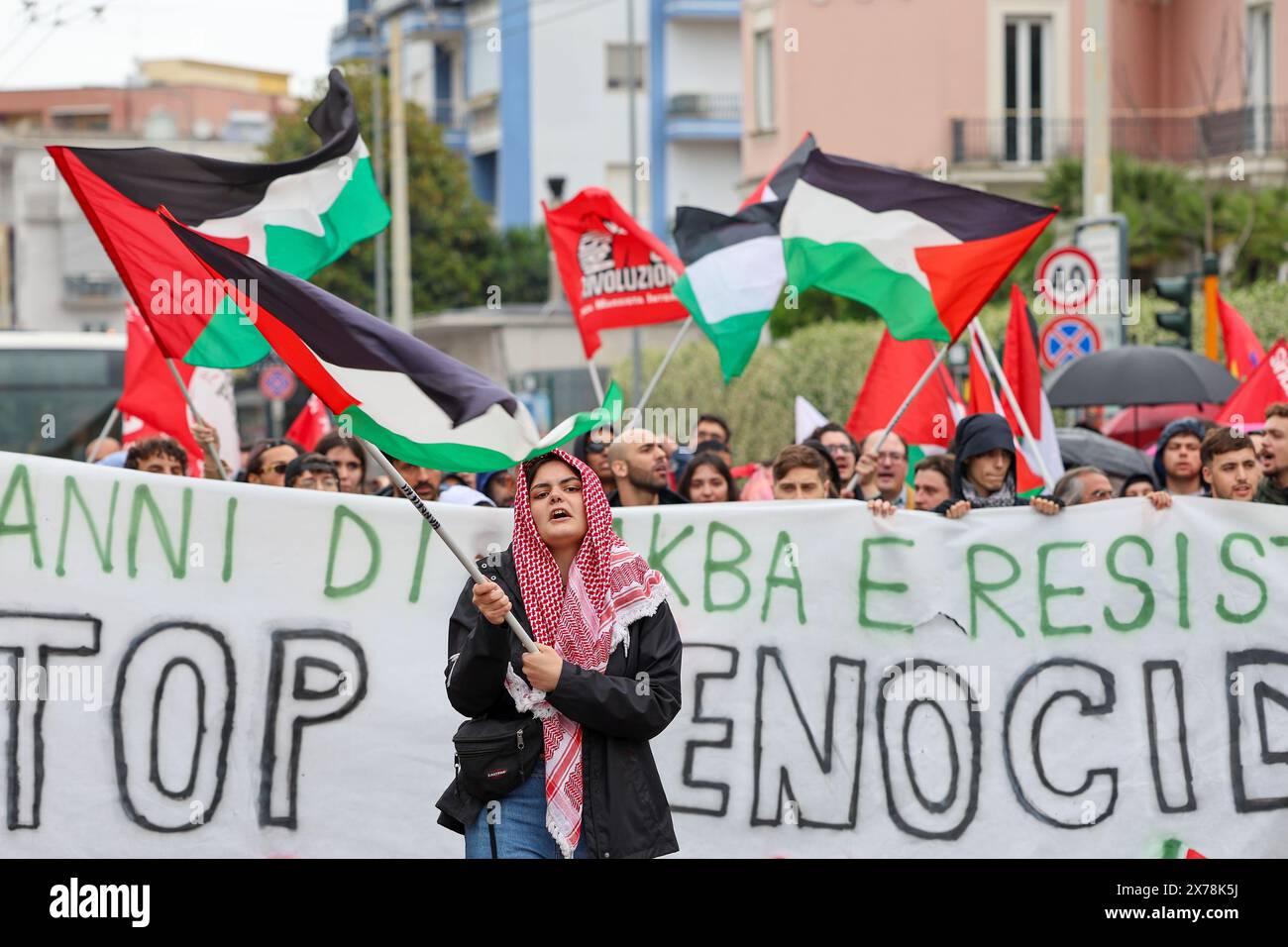 Aversa, Italy, 18 May 2024. People during a demonstration in solidarity with the Palestinian people and against the massive Israeli attacks on the Gaza strip. Stock Photo
