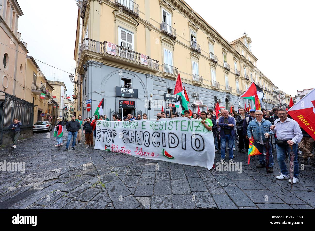 Aversa, Italy, 18 May 2024. People during a demonstration in solidarity with the Palestinian people and against the massive Israeli attacks on the Gaza strip. Stock Photo