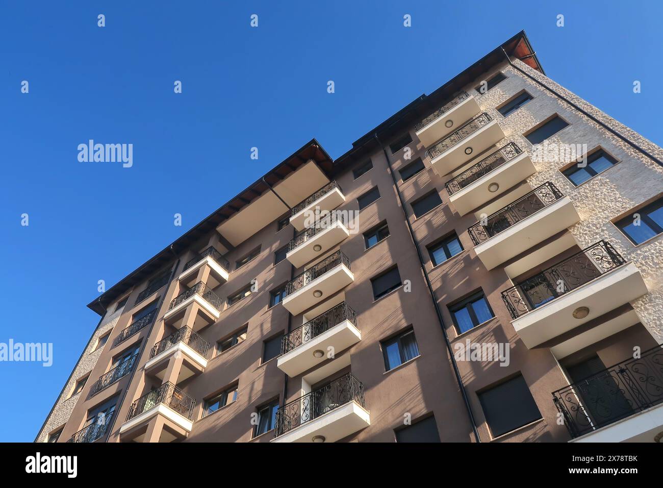 Modern apartment building and blue sky Stock Photo - Alamy