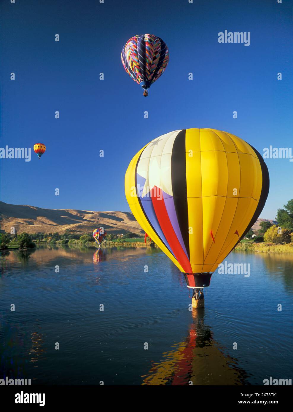 Hotair balloons over Yakima River during the annual Prosser Balloon