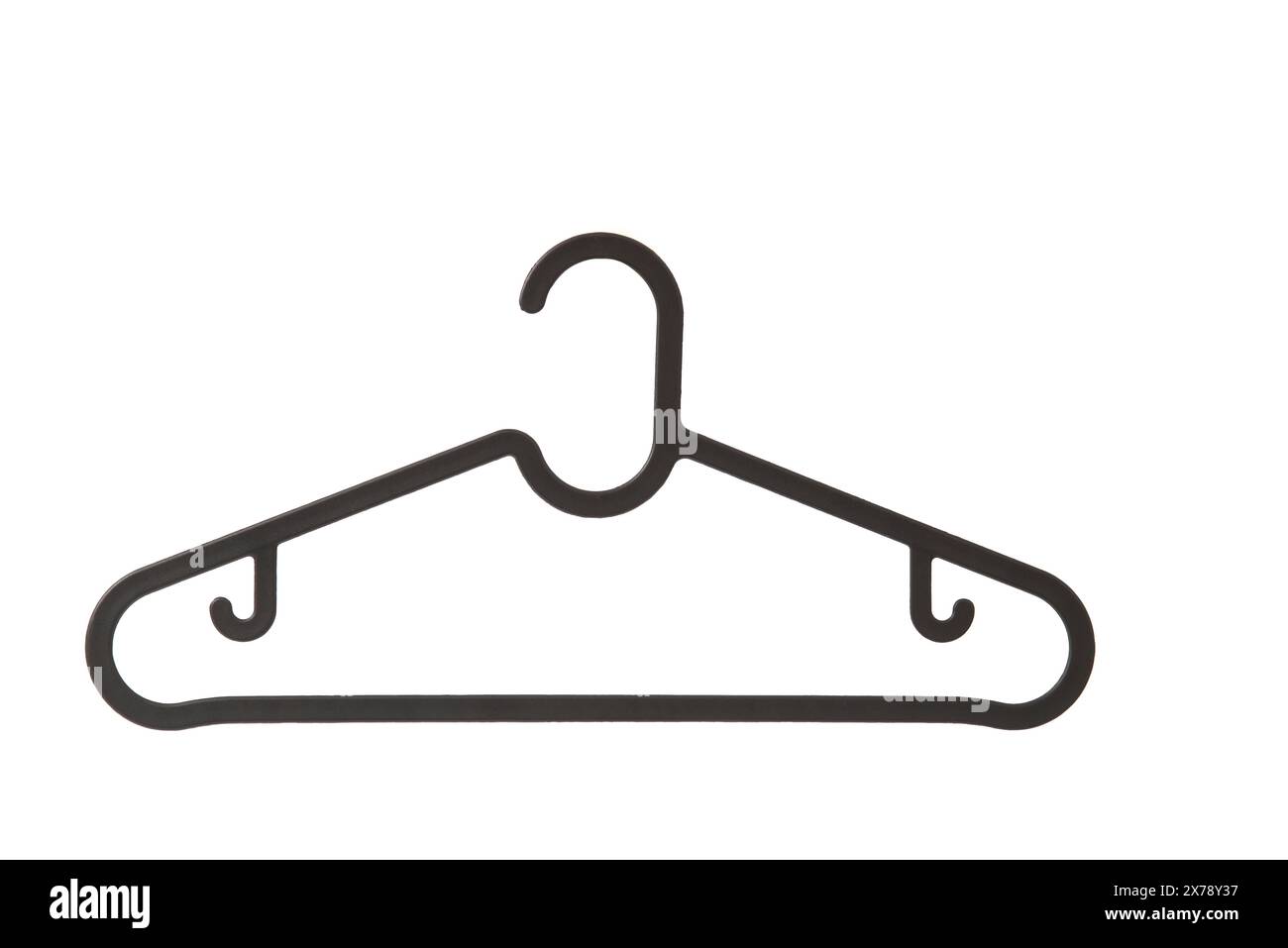 Black plastic hanger isolated over the white background. Stock Photo