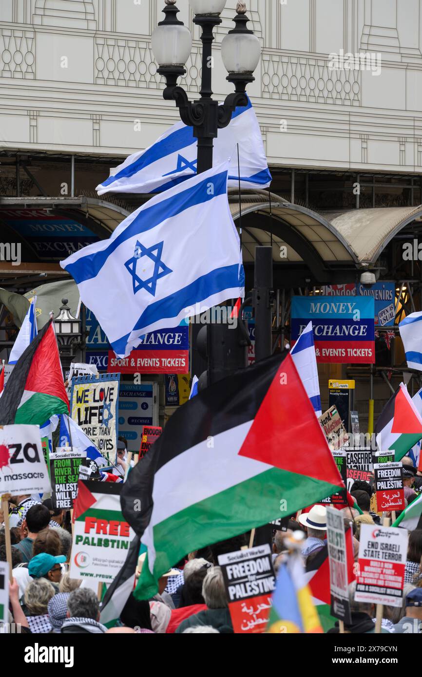 Demonstrators on a Pro-Palestine march passing a Pro-Israel counter