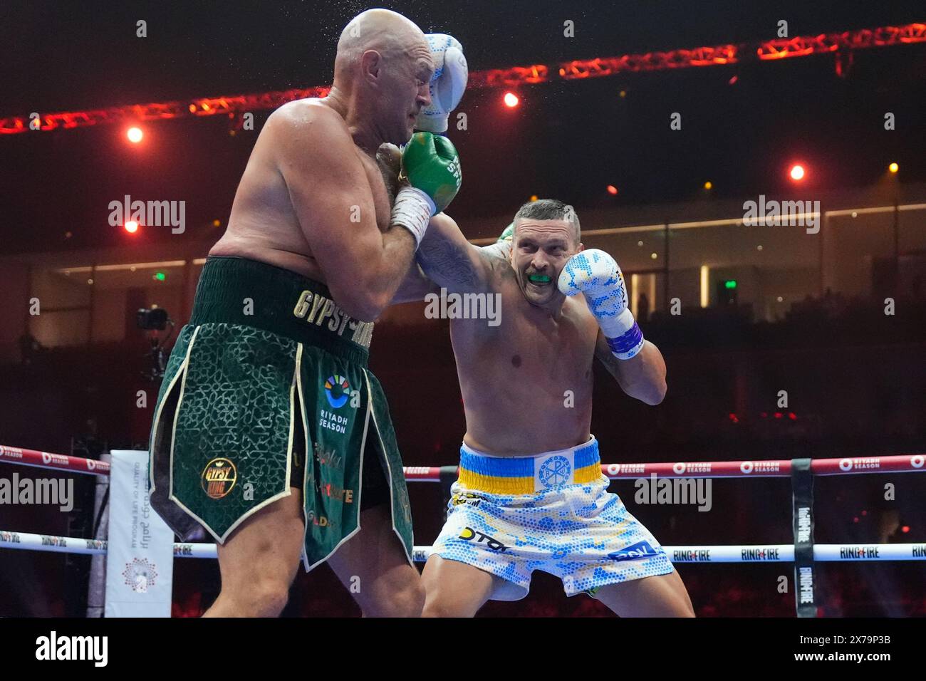 Tyson Fury (left) in action against Oleksandr Usyk during the