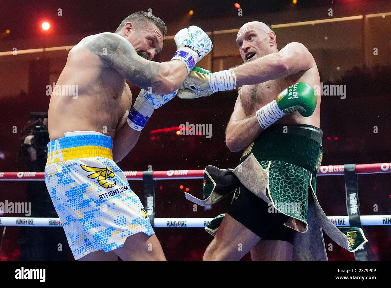 Tyson Fury (right) in action against Oleksandr Usyk during the