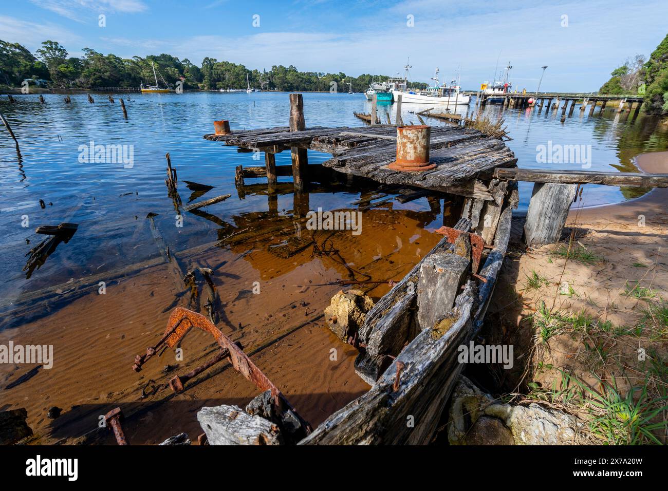 Remains of wooden timber barges abandoned and rotting in Risby Cove ...