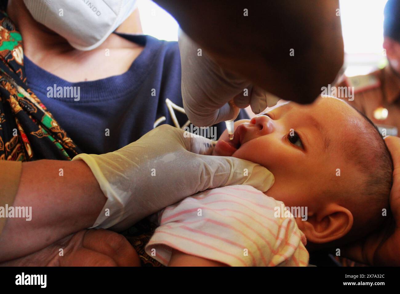 Medan, North Sumatra, Indonesia. 18th May, 2024. One of the medical teams is giving nutritional vitamin intake vaccines to Indonesia children in Medan North Sumatra. (Credit Image: © Kartik Byma/ZUMA Press Wire) EDITORIAL USAGE ONLY! Not for Commercial USAGE! Stock Photo