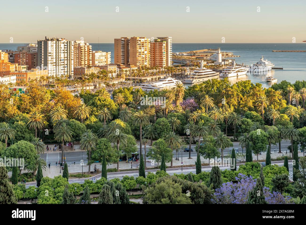 Aerial View Of Paseo Del Parque And Pier In Malaga Spain In Sunset aerial-view-of-paseo-del-parque-and-pier-in-malaga-spain-in-sunset