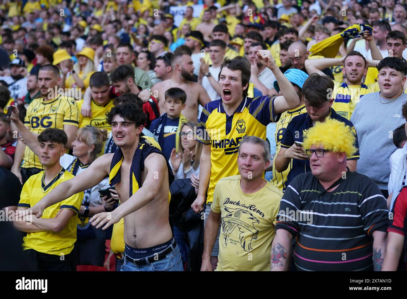 LONDON, ENGLAND - MAY 18: Oxford United fans celebrating after the Sky Bet League One Play-Off Final match between Bolton Wanderers and Oxford United at Wembley Stadium on May 18, 2024 in London, England.(Photo by Dylan Hepworth/MB Media) Stock Photo