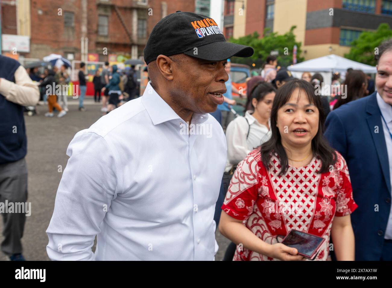 New York City Mayor Eric Adams (C) arrives at the Indonesian Culinary
