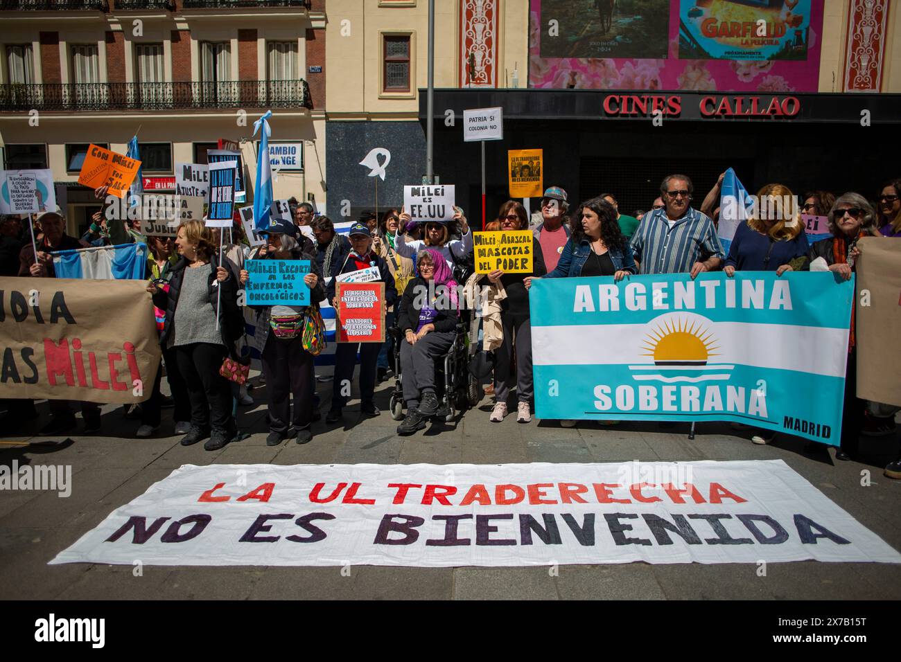 Madrid, Spain. 18th May, 2024. Protesters hold placards and flags of Argentina, during a rally in the Plaza de Callao in Madrid, under the slogan 'The extreme right is not welcome', before Milei's visit to Spain. The far-right party in Spain, VOX, celebrates the 'Europa Viva 24' event in Madrid on May 19, which will be attended by the President of the Republic of Argentina, Javier Milei, along with other right-wing European politicians. (Photo by Luis Soto/SOPA Images/Sipa USA) Credit: Sipa USA/Alamy Live News Stock Photo