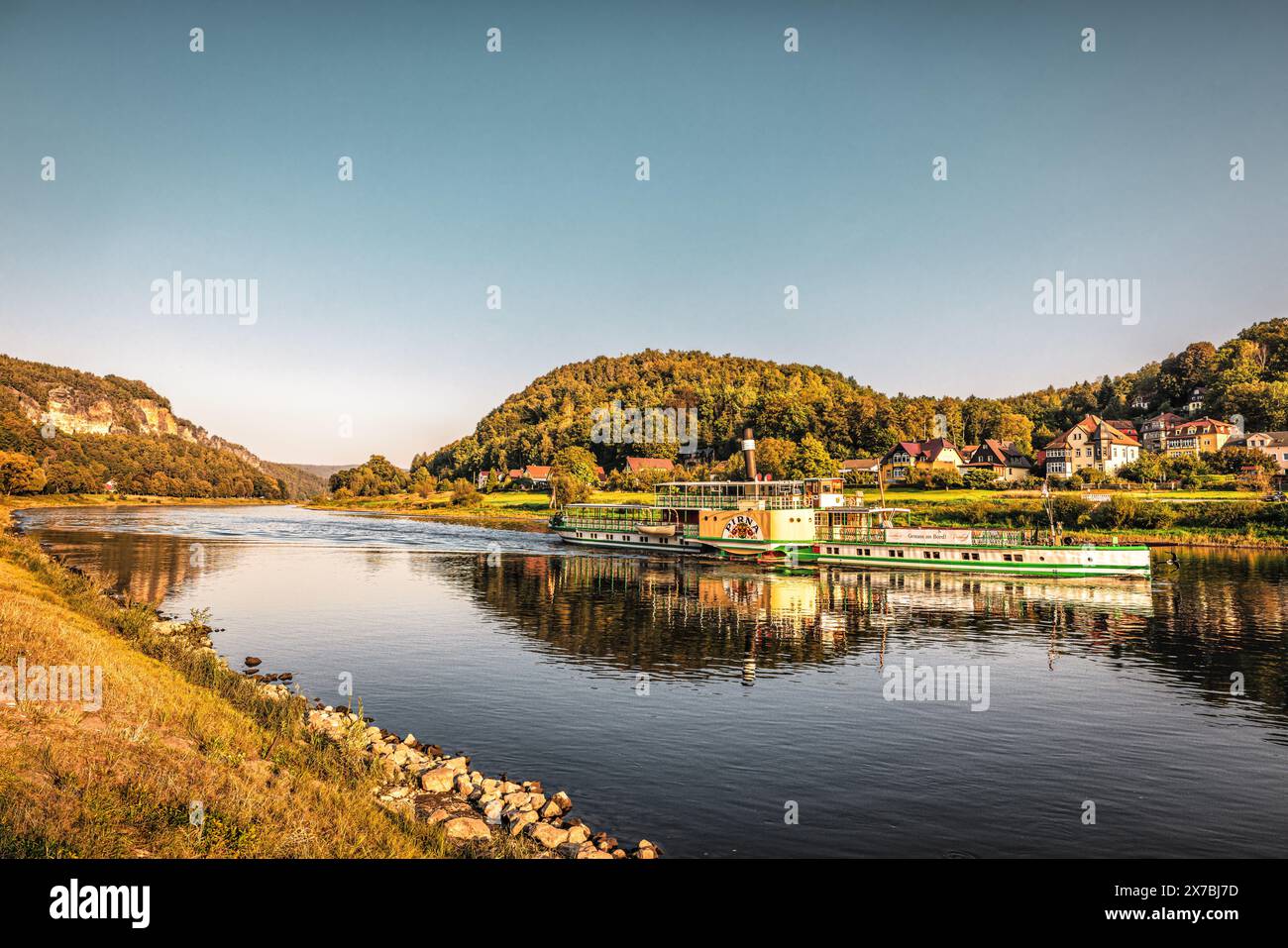 The Elbe river in Saxon Switzerland with paddle steamers, sunset, reflection Stock Photo