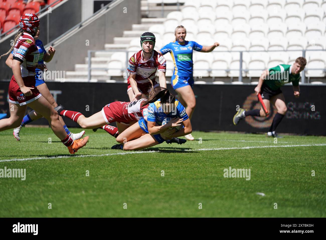 St Helens, Merseyside, UK. 19th May, 2024. Betfred Challenge Cup Rugby: Wigan Warriors Women Vs Leeds Rhinos Women at Totally Wicked Stadium. Ruby Enright  scores in the corner. Credit James Giblin Photography/Alamy Live News. Stock Photo