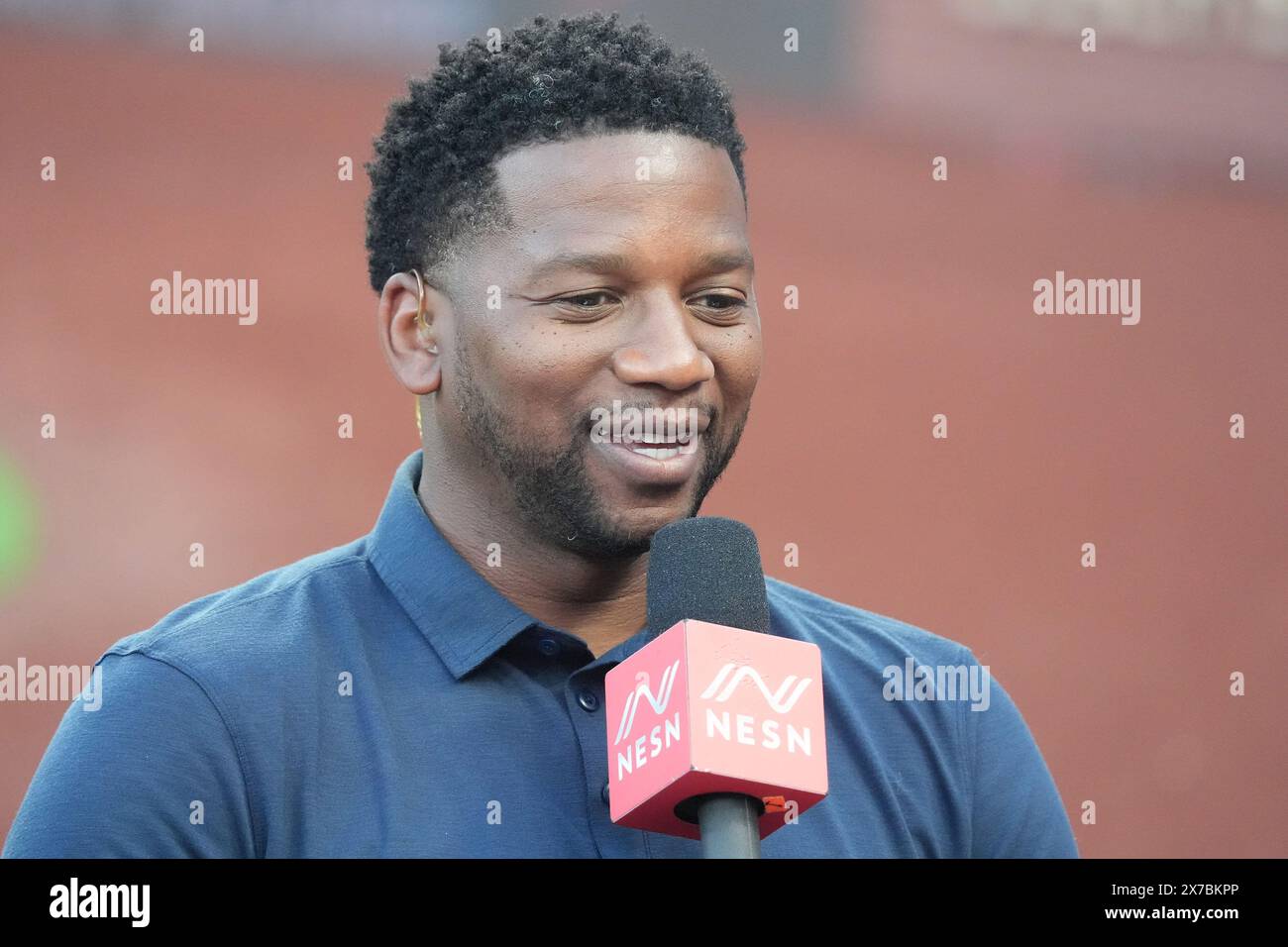 Boston Red Sox sideline reporter Jahmai ster talks to his audience