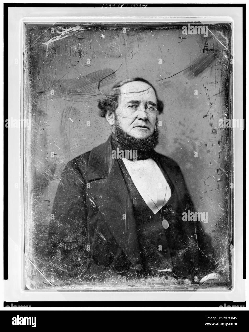 Unidentified man, half-length portrait, three-quarters to right, eyes front, with monocle suspended around neck, Scratched on face of plate: 256; Capt. Dunn. Scratched on back of plate: 127., Alternative identification: Mr. Dunn (Captain Charles Dunn who served in the Black Hawk War and later became Chief Justice of the Wisconsin Territorial Supreme Court)., Transfer; U.S. War College; 1920; (DLC/PP-1920:46153)., Forms part of: Daguerreotype collection ,  Produced by Mathew Brady's studio. Stock Photo