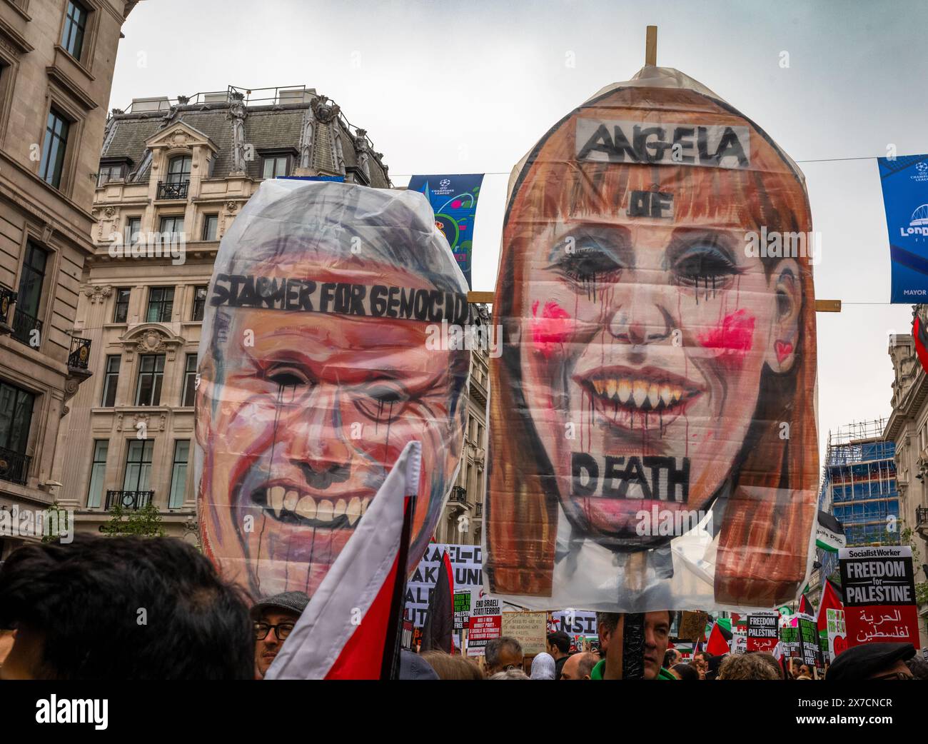 London, UK. 18 May 2024: Protesters hold placards attacking Labour leader Keir Starmer and his deputy Angela Rayner for not supporting a Gaza ceasefir Stock Photo