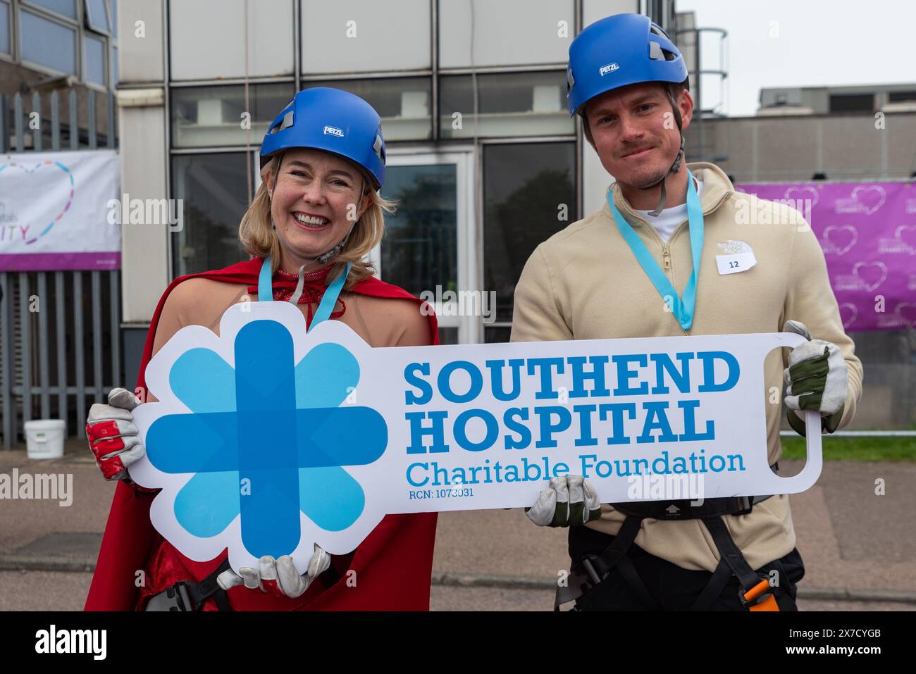 Anna Firth MP & Cllr Jack Warren after abseiling down the main tower block of Southend Hospital for charity titled Tackle the Tower Stock Photo