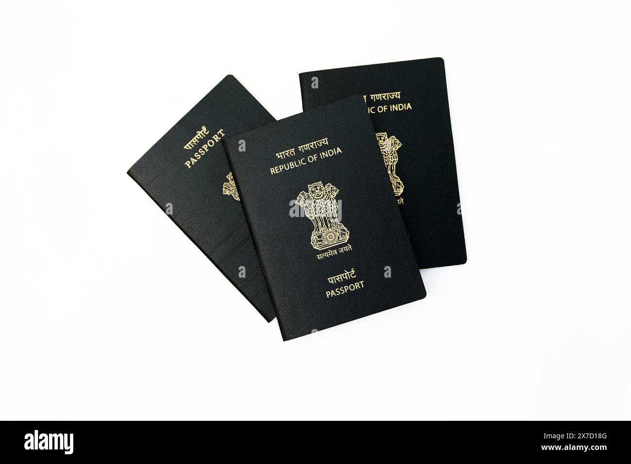 Indian passport with maroon cover isolated on white background, perfect for travel and tourism concepts. Stock Photo