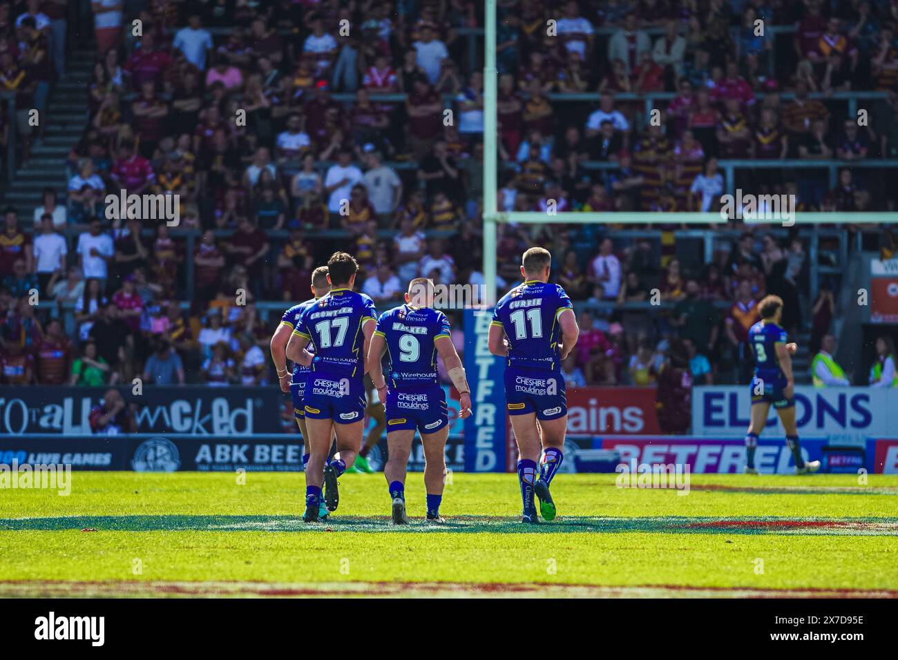 St Helens, Merseyside, UK. 19th May, 2024. Betfred Challenge Cup Rugby: Huddersfield Giants Vs Warrington Wolves at Totally Wicked Stadium. Warrington player Danny Walker, Ben Cuttie and  Jordy Crowther walking back after the Warrington try. Credit James Giblin Photography/Alamy Live News. Stock Photo