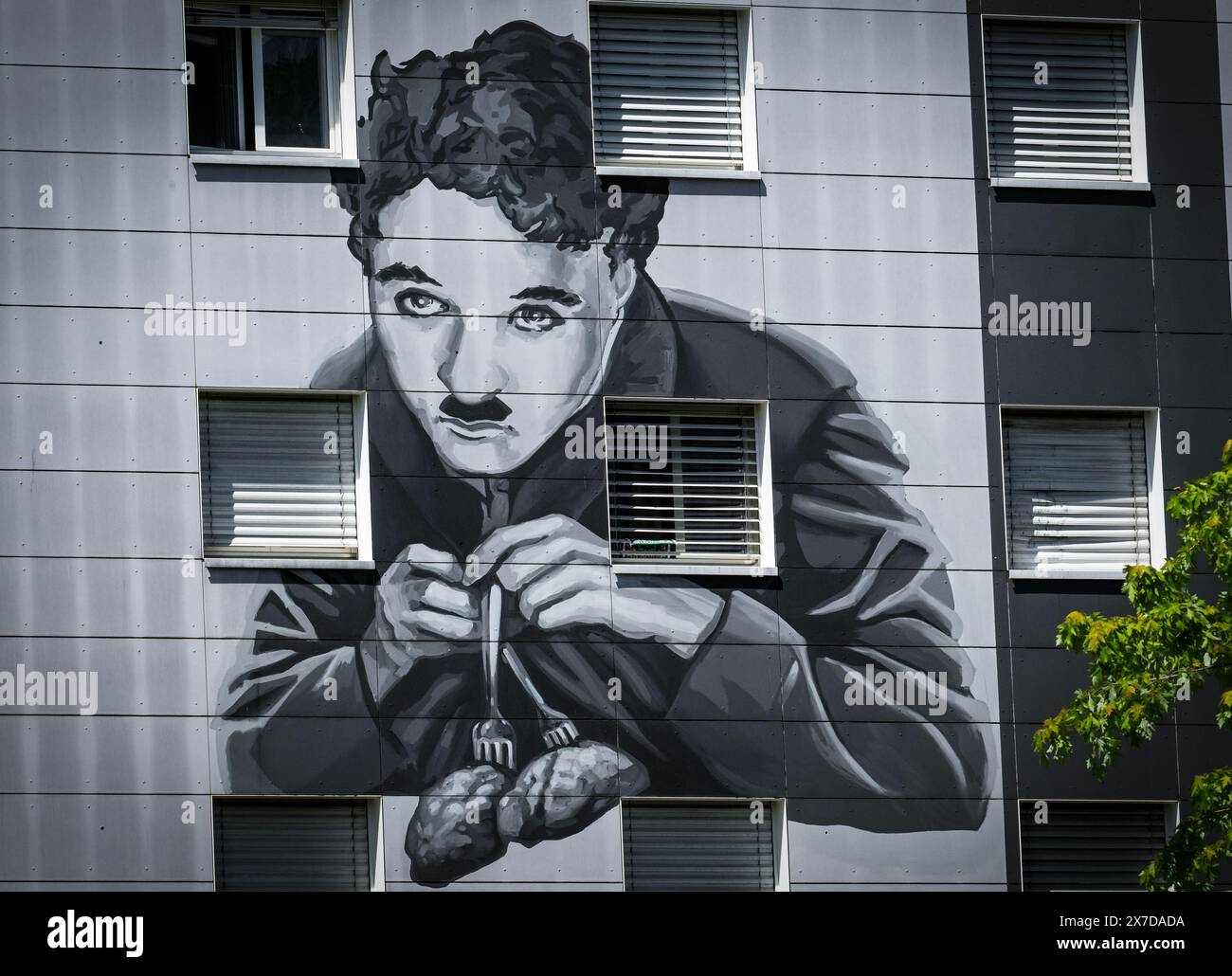 A giant fresco of Charlie Chaplin is seen on a block of flats dubbed ...