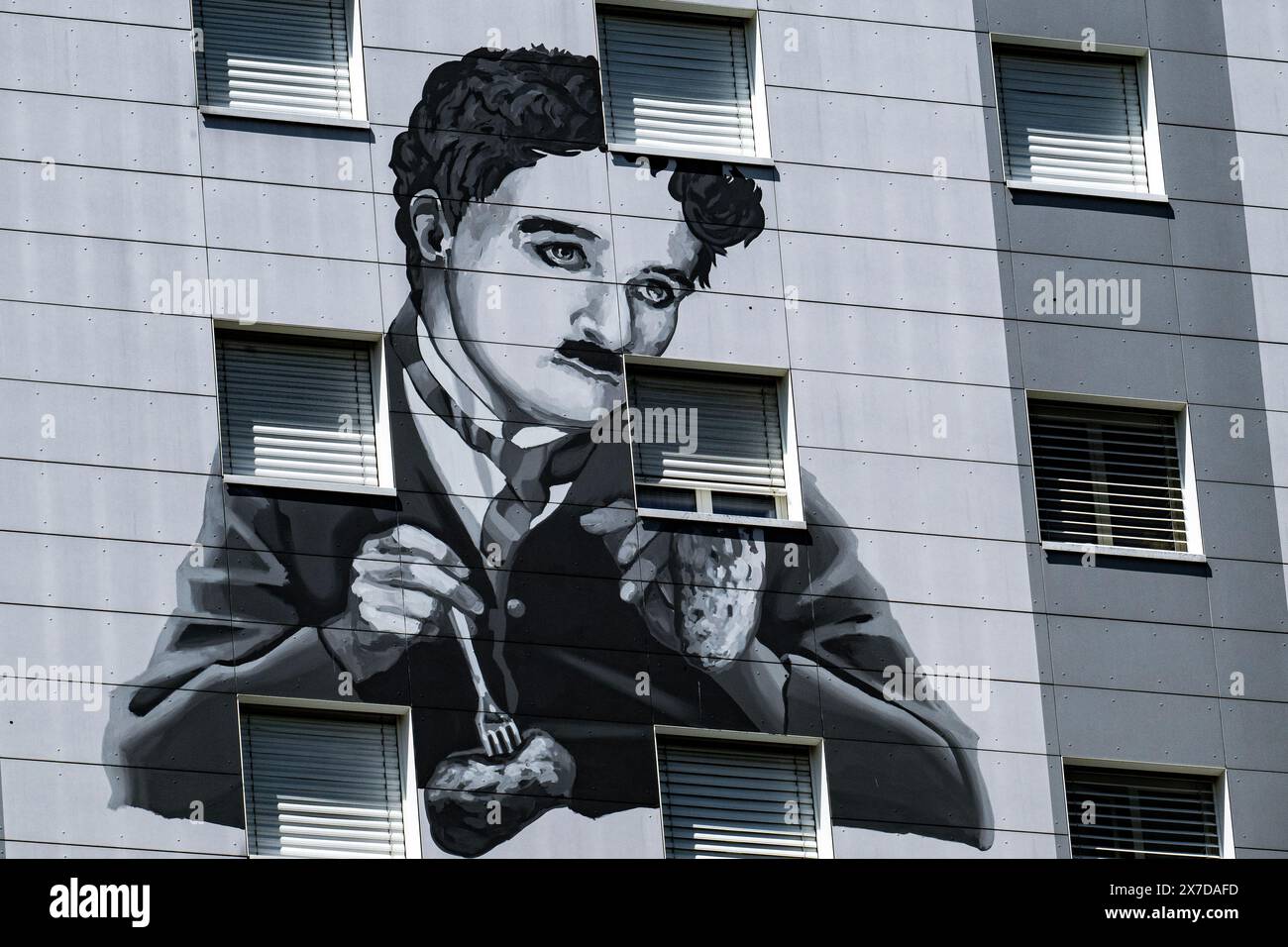 A giant fresco of Charlie Chaplin is seen on a block of flats dubbed