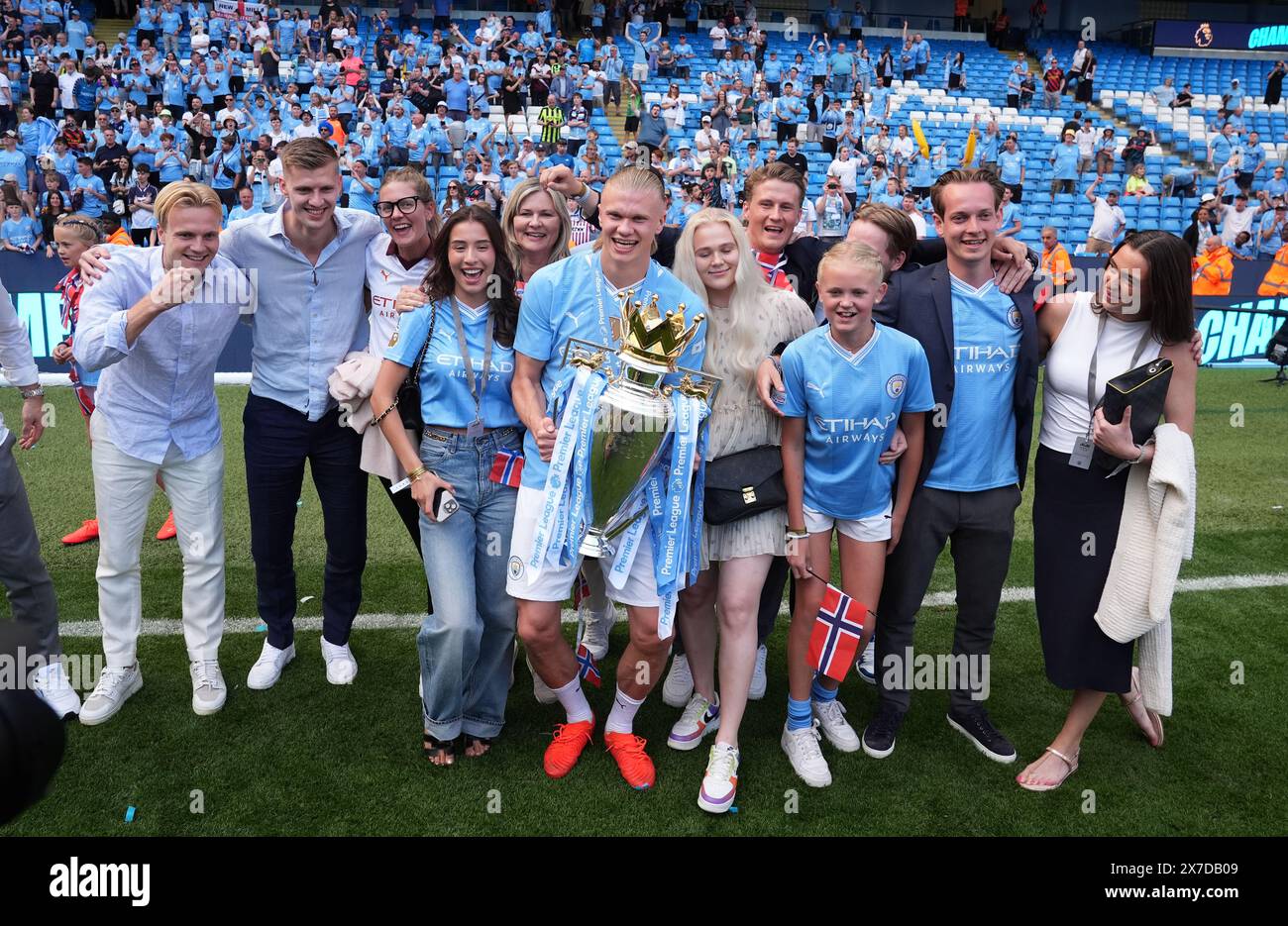 Manchester City's Erling Haaland celebrates with the Premier League ...