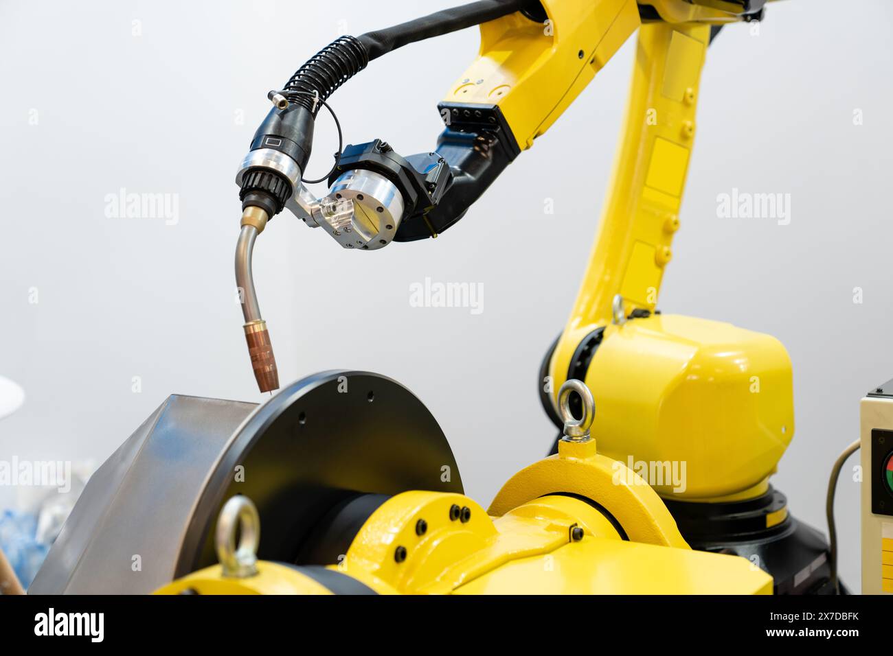 Welding robot arms on a smart factory. Stock Photo