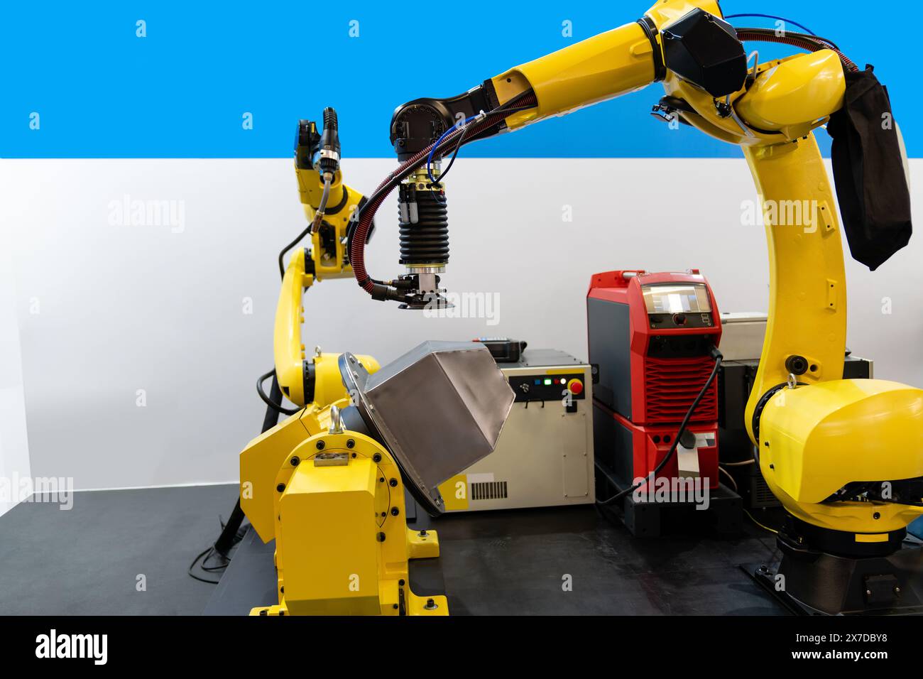 Welding robot arms on a smart factory. Stock Photo
