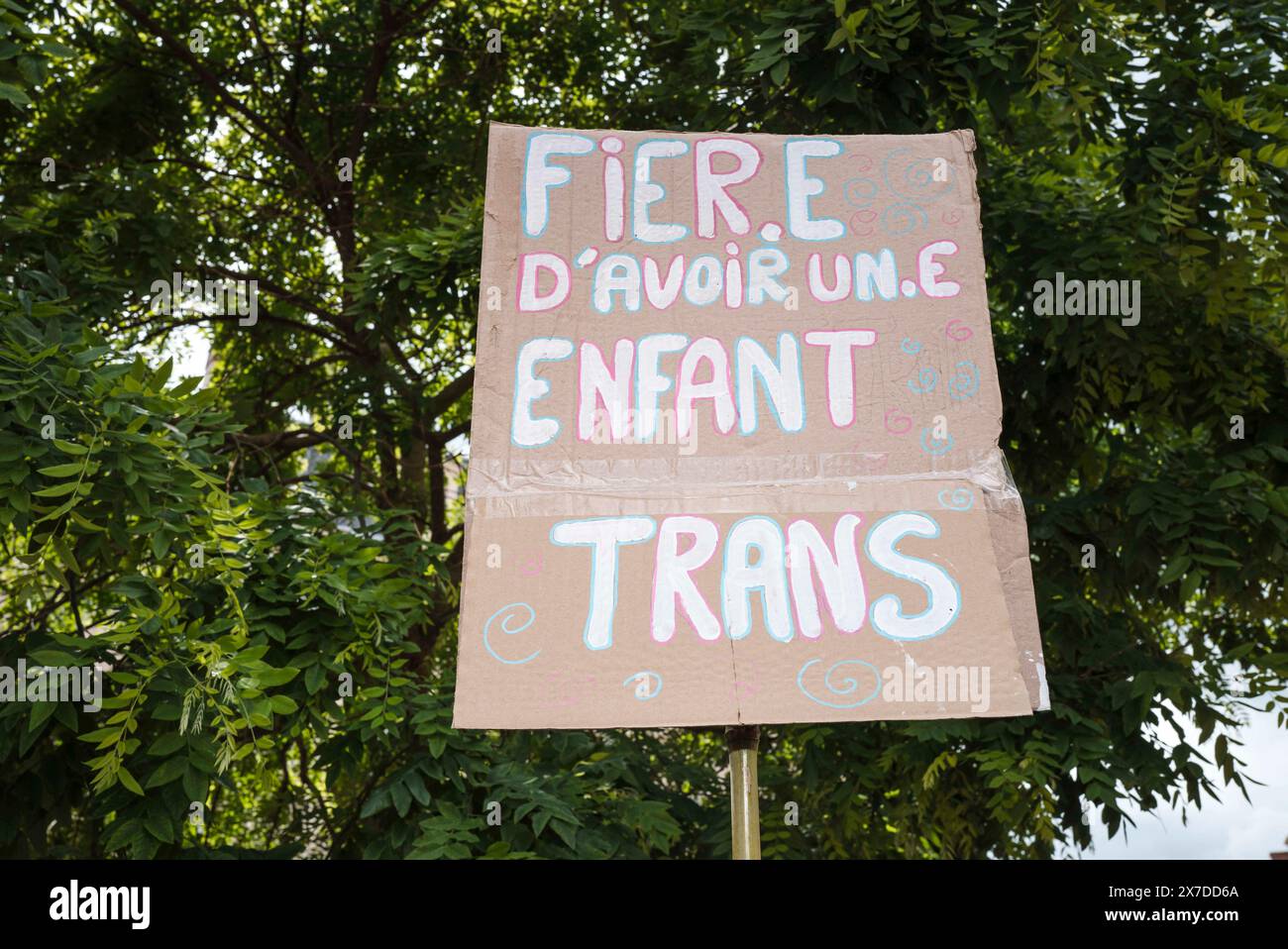 Agen, France. 19th May, 2024. A placard, Proud to have a Trans child. Pride march in Lot-et-Garonne, Organised by Le Collectif Pride 47 which brings together 47 LGBTQIA Associations in Lot-et-Garonne, it implements projects to defend the rights of LGBTQIA  people, and organises events for the LGBTQIA  community. France, Agen on 18 May 2024. Photo by Patricia Huchot-Boissier/ABACAPRESS.COM Credit: Abaca Press/Alamy Live News Stock Photo