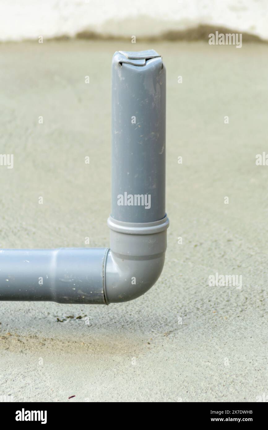 installation of water pipes under foundation of new construction Stock