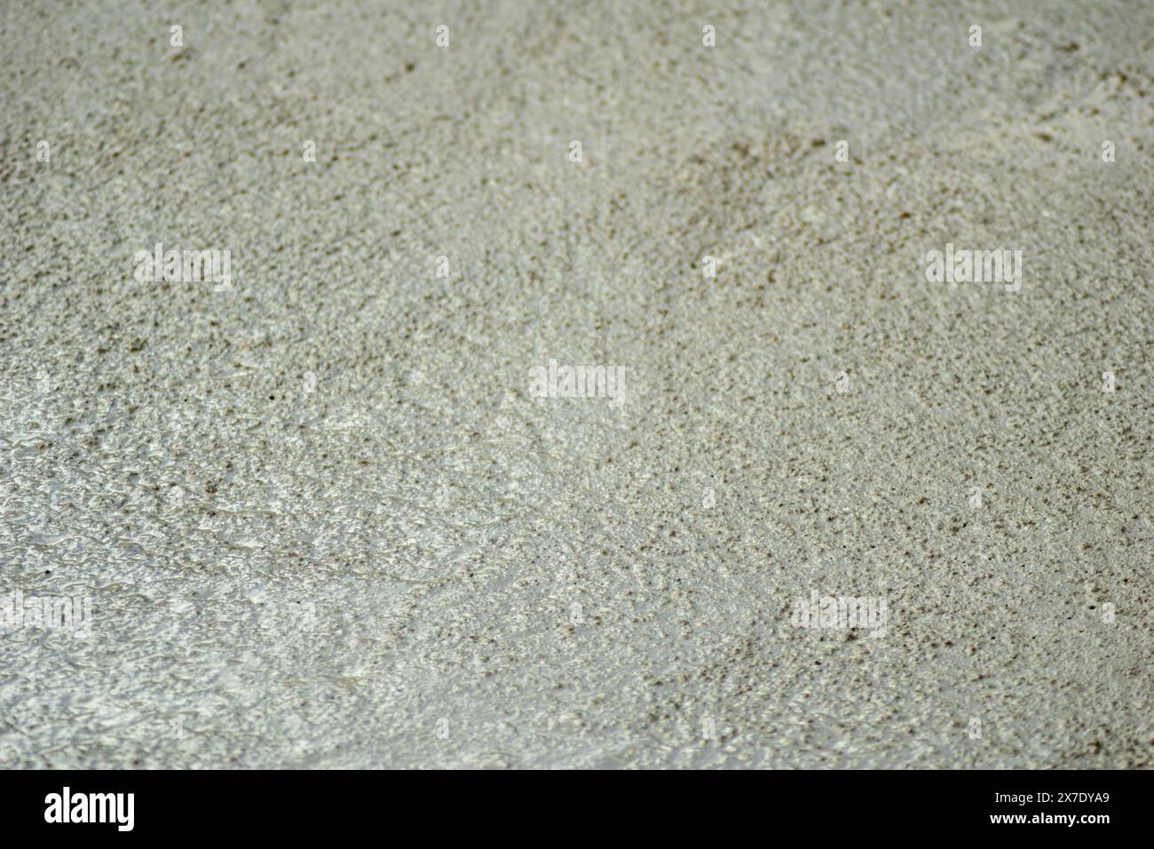 Selective focus, textured background image of fresh mixed concrete in construction Stock Photo